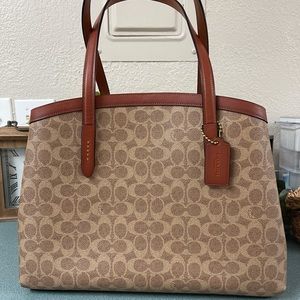 Coach Charlie 40 carryall. Large size Tan rust.